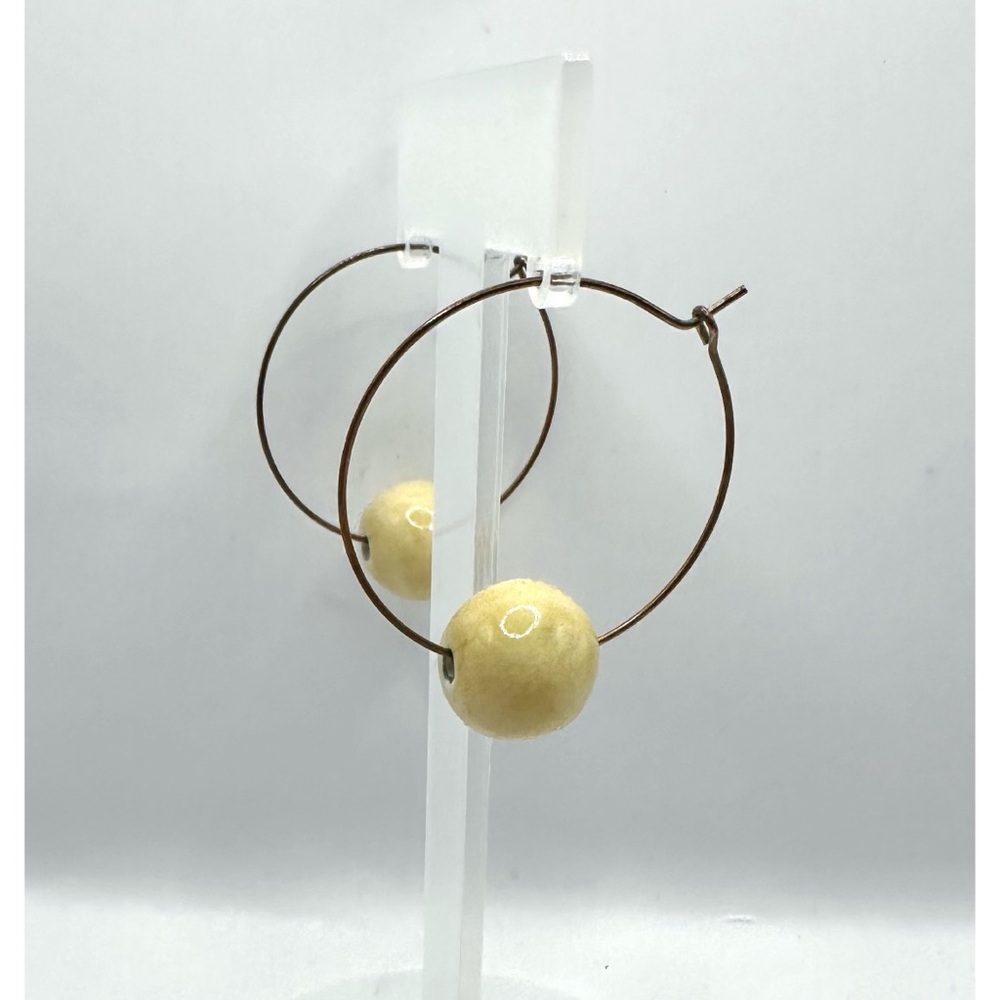 Handcrafted pair of Lightweight hoop earrings, featuring artisan ceramic beads